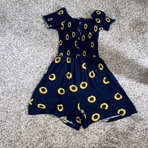 Blue romper with sunflowers